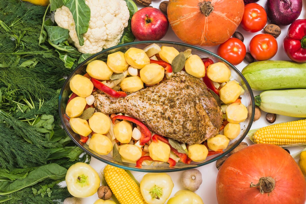 Colourful display of vitamin B5-rich foods including chicken breast, sweet potatoes, lentils and broccoli