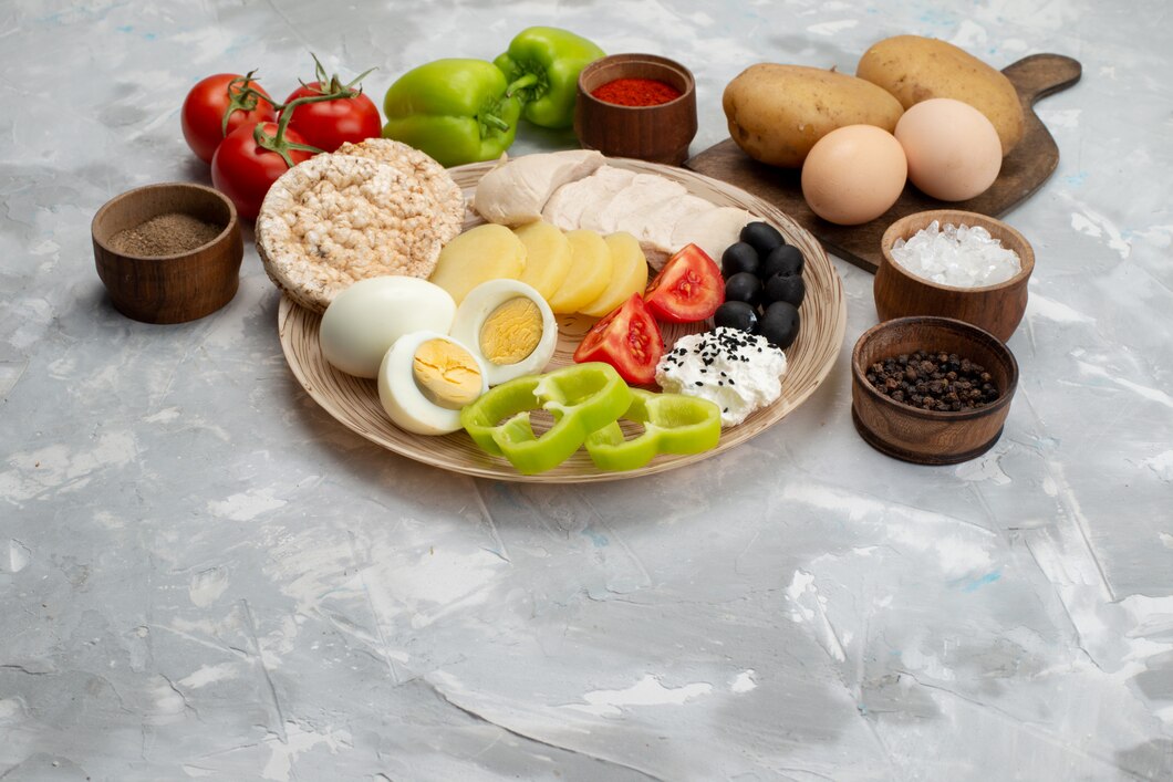 Various foods rich in vitamin K2 including natto, cheese, egg yolks and grass-fed butter